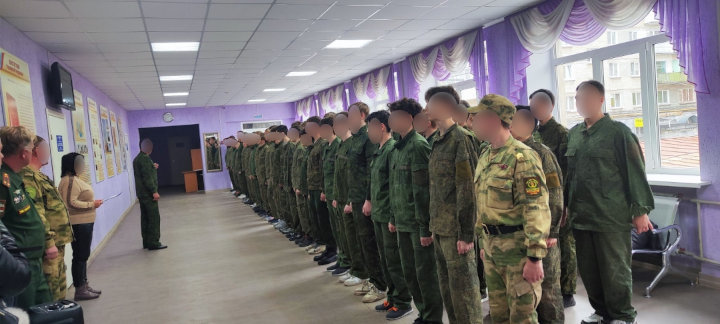 Credit: Military student club 'Fakel'; Students in military fatigues at an Avangard 24h training.