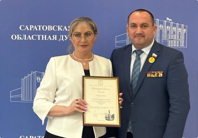 Credit: MAOU 'Lyceum No. 3 named after A.S. Pushkin'; School director receives an award for contribution to patriotic education.