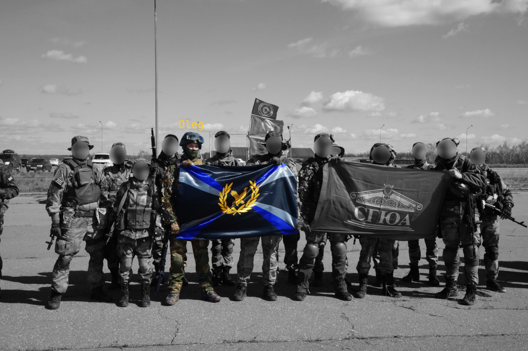 Credit: VKontakte War Games: Operation Satellite; Berkut members stand in formation at the Airsoft event